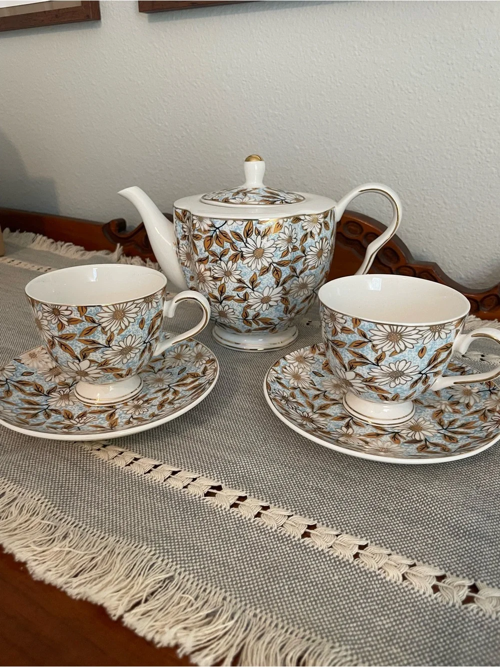 Elegant Floral Porcelain Teapot and Cup Set in Blue and Gold